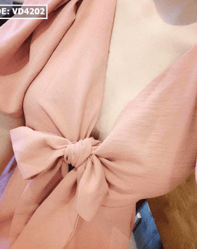 Đầm hồng xòe vải đũi cột nơ tay phồng